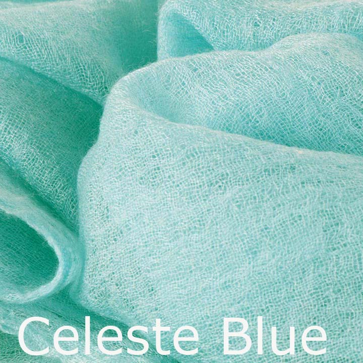 Featherlight and felted blue cashmere scarf collection.