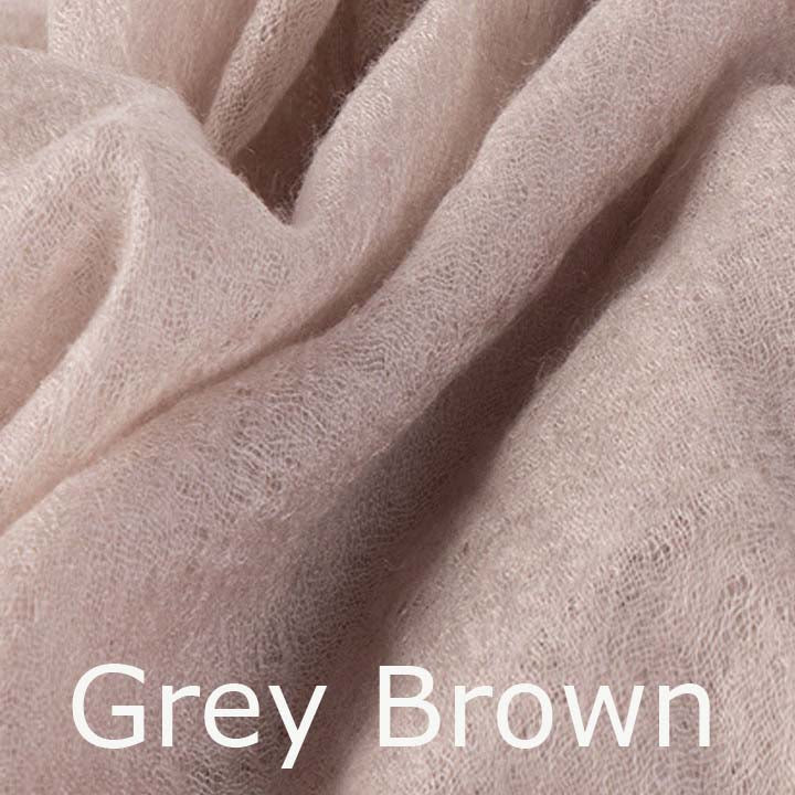 Featherlight and felted brown cashmere scarf collection.