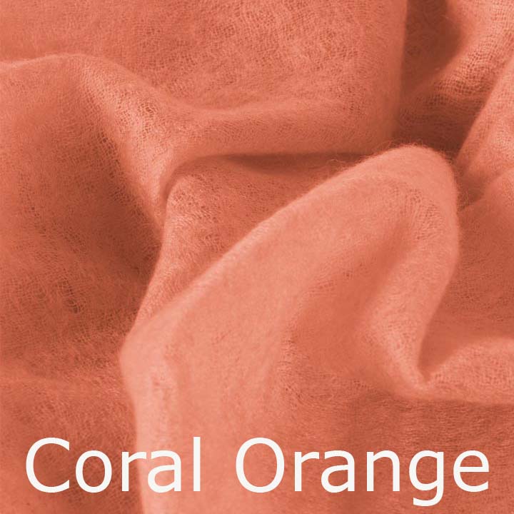 Featherlight and felted orange cashmere scarf collection.