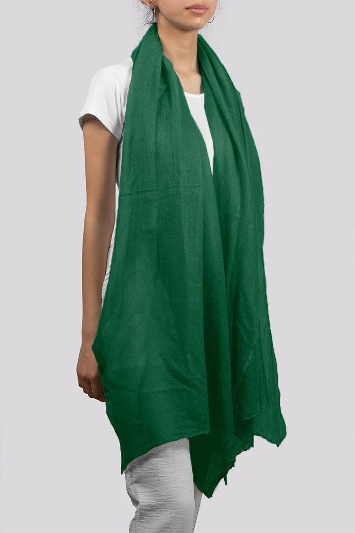 Full view of all season's forest green cashmere scarf  with a nice drape.
